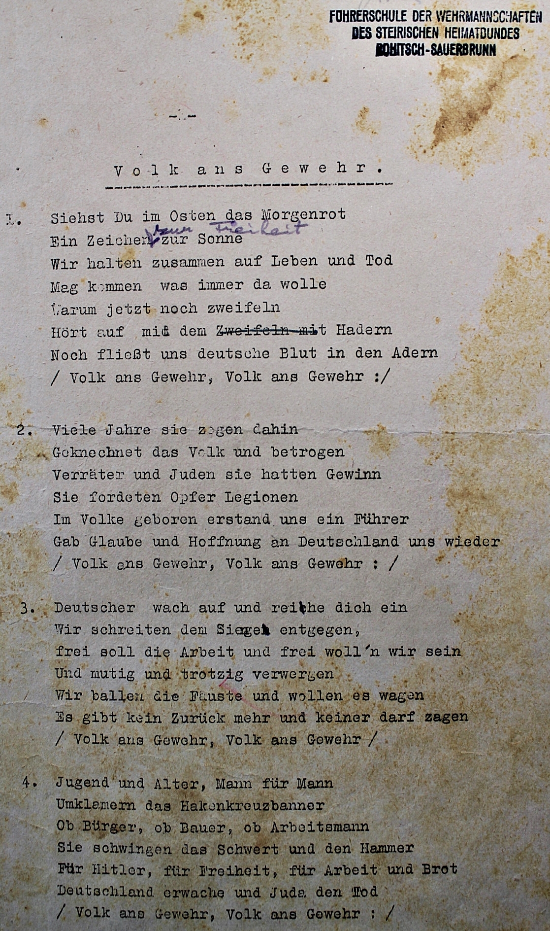Slika 8: Besedilo nemške pesmi ki se je med drugim prepevala tudi v prostorih zdraviliške šole SA. Na vrhu dokumenta je razviden tudi uradni žig častniške šole.